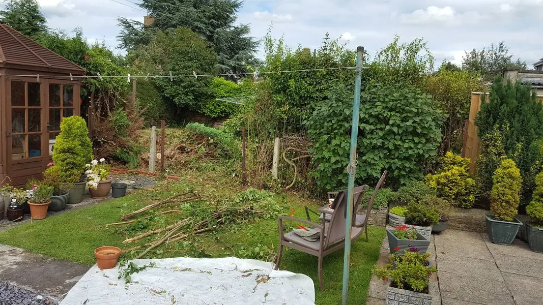 A finished garden with seating, paving, decking and fencing